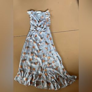 Blue ruffled v neck maxi dress with floral design